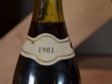 a bottle of wine that is sitting on a table
