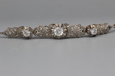 Bracelet en or et platine enrichi de pierres.P 6,9g - Photo 1