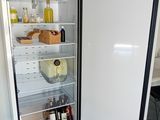 an open refrigerator with a lot of food inside of it