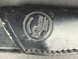 a close up of a knife on a table