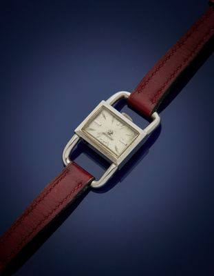 une photo d'une montre-bracelet avec un bracelet en cuir rouge