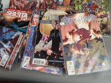 a lot of comic books on the table