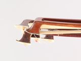 a close up of a violin with a bow on it