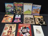 diverses bandes dessinées posées sur une table noire, sur fond noir