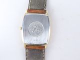 a close up of a wrist watch with a leather band