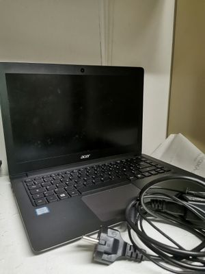 a laptop computer that is sitting on a table