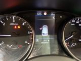 the dashboard of a car with a digital display on it