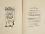 an open book with a drawing of a cat on it