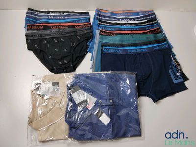 several men ' s underwear are wrapped in plastic bags on a table