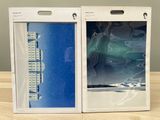 packaging of a white and blue box with a picture of a building