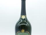 an image of a bottle of wine sitting on top of a table