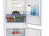 an open refrigerator with a lot of food inside of it