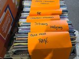 boxes of cds are stacked on top of each other in a carton