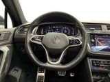 the interior of a car with a steering wheel and dashboard controls