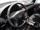 a steering wheel and dashboard of a car in a car showroom