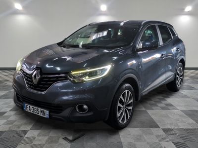a grey renault kad suv parked in a showroom