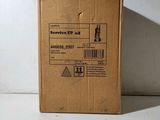 a cardboard box with a label on it sitting on a table