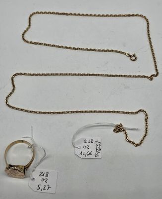 three pieces of jewelry are displayed on a white surface