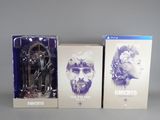 two boxed boxes with a figure of a man and a statue of a man