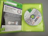 a green case with a cd inside of it