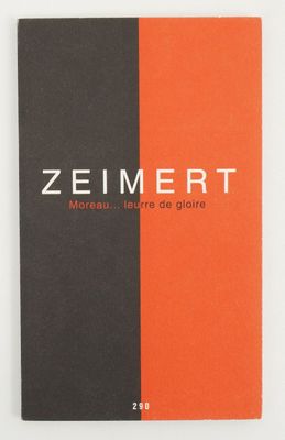 a book with an orange and black cover on a white surface