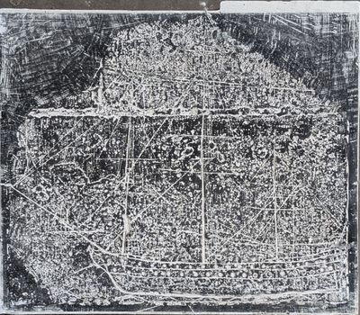an old black and white photo of a city with lots of buildings