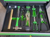 many different tools in a tool box on the floor