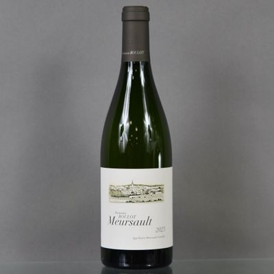 a bottle of wine that is sitting on a table