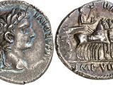 a silver coin with an image of a man on a horse
