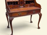 an old wooden desk with two drawers and a drawer underneath it