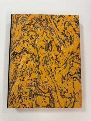 an abstract painting on a yellow surface with black and green paint