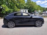 2020 honda cr - v parked in a parking lot with trees in the background