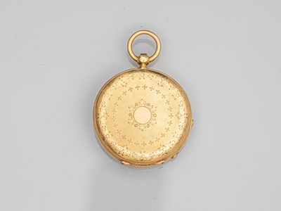 une montre de poche en or 18 carats, dotée d'un cadran circulaire et d'une chaîne