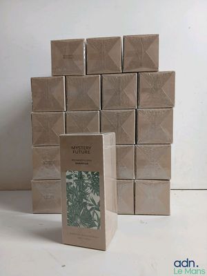 a stack of boxes with a picture of a plant on them