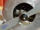 a close up of an airplane propeller on a table