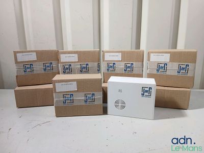 several boxes are stacked on top of each other on a table