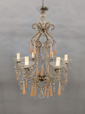 an image of a chandelier hanging from the ceiling in a room