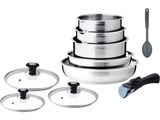 several stainless steel pots and pans with lids and spoons