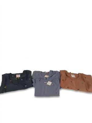 three men ' s shirts are lined up on a white background