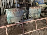 a large metal tub sitting in the middle of a barn