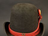 brown hat with orange cord around the brim of the brim of the brim of the brim of the brim of the brim of the br