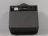 a close up of a guitar amplifier sitting on top of a table