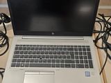 a laptop computer that is sitting on a table