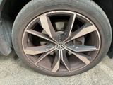 a close up of a tire on a car ' s rim