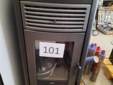 a picture of a stove in a store with a price tag on it