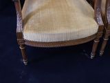 two chairs that are sitting next to each other