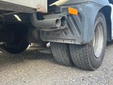 a truck that is parked on the side of the road
