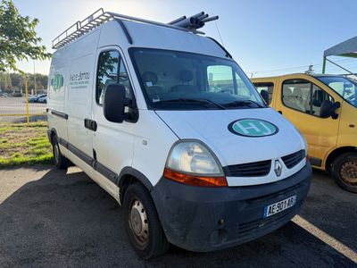 the white van is parked in the parking lot next to the yellow van