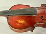 a violin that is sitting on top of a table