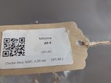 a label on a piece of paper with a qr code attached to it